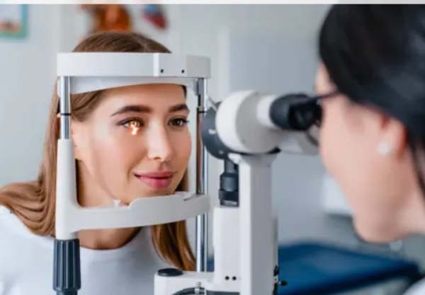 Eye examination for glaucoma using a slit lamp by an ophthalmologist.
