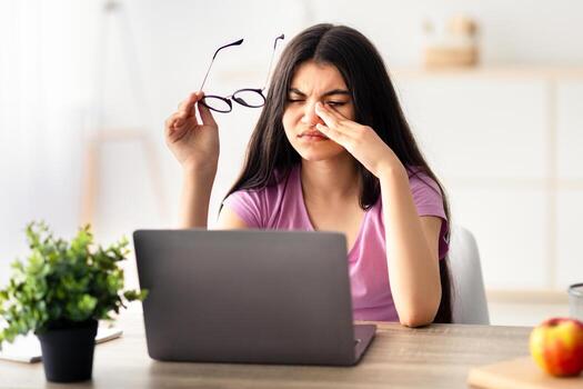 Dry eye symptoms including burning redness and gritty eyes