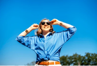 Best Eye Care Habits After 40 Adult wearing UV-protective sunglasses outdoors for eye protection
